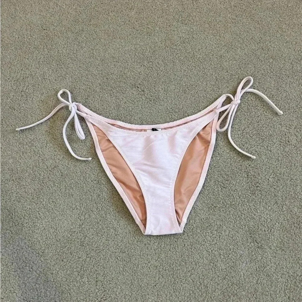 New with tags J Crew Ribbed pink curved-waist cheeky string bikini bottom